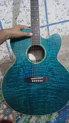 acoustic guitar hai jumbo size mai hai