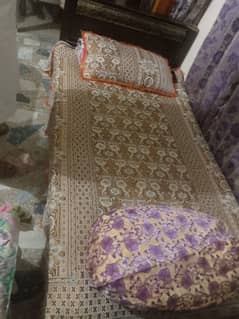 2 wooden single bed