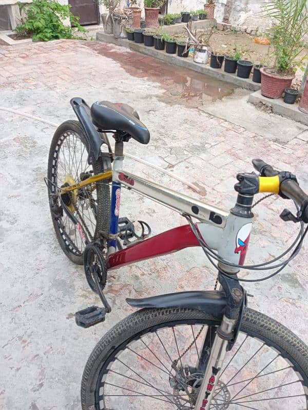 Gears bicycle with disk break and showks 0