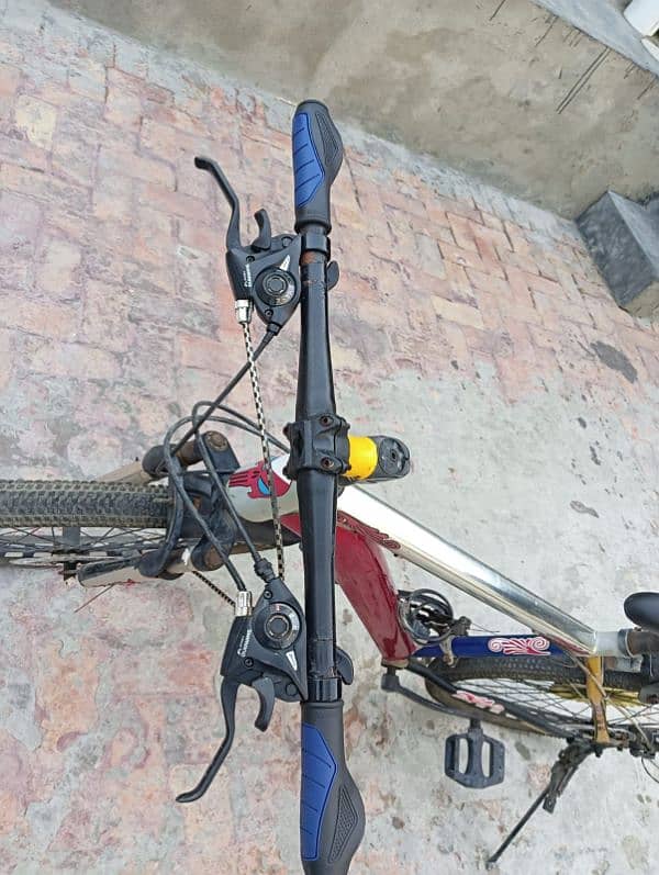 Gears bicycle with disk break and showks 6