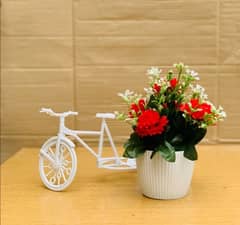 Unique floral cycle decoration with artificial flower bicycle