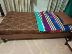single wooden bed