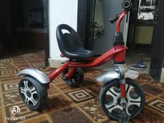 kids tricycle red colour smooth drive in great condition
