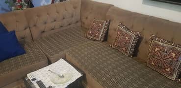 L shape 7 seater sofa normal condition  solid material urgent sale