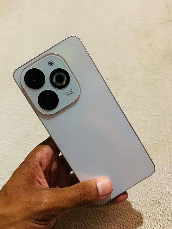Infinix smart 8 pro with good condition and with box and charger. 1