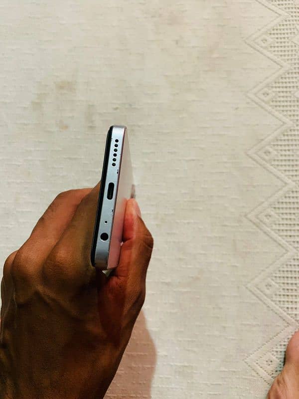Infinix smart 8 pro with good condition and with box and charger. 5