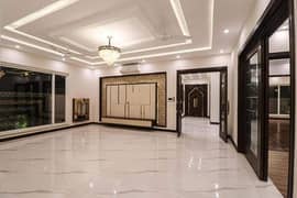 Hot Rental in DHA Phase 6 1-Kanal Modern Design Bungalow with Solar System, Air Conditioning, and a Beautiful Lawn Near  Defence Raya