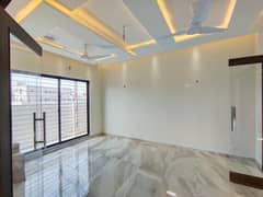 Stylish 1-Kanal Lower Portion Upper Lock For Rent In DHA Phase 5 2-Bedrooms, Modern Kitchen, Drawing, Dining, TV Lounge, Kitchen Store, And Lush Green Lawn In A Prime Location