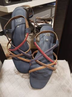 Branded heels and causal wear