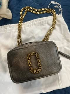 Slightly use Popular Marc Jacobs Handbag . Like new