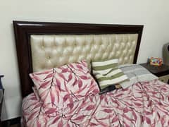 Double bed with side tables and dressing table