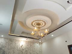 Beautiful 5 Marla triple Story Designer House for Sale in LDA Avenue 1, F Block - 7+ Baths, 6+ Bedrooms, Prime Location Near Park, Zoo & Masjid!