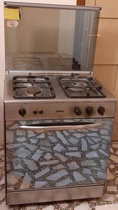 Cooking range with 3 burner and oven