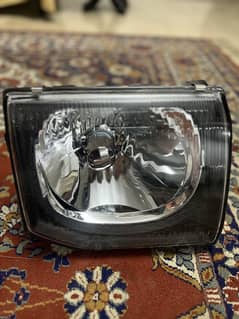 Mitsubiahi pajero right head light new