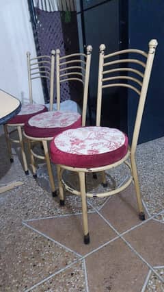 Iron dining table with six chairs