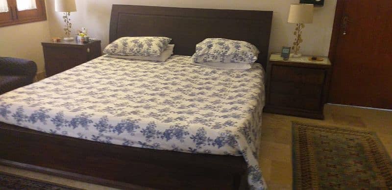 double bed attached with side table , dressing table condition 10/10 . 1