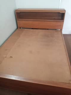 wooden double bed