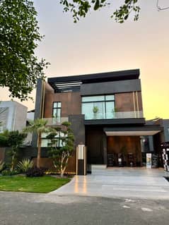 One Kanal Brand New Luxury Ultra-Modern Design Most Beautiful Full Basement Fully Furnished Home Theater Swimming Pool Bungalow For Sale At Prime Location Of DHA Lahore Near To Park Defence Raya Fairways Commercial