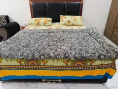 Double Bed Queen sized with mattress.