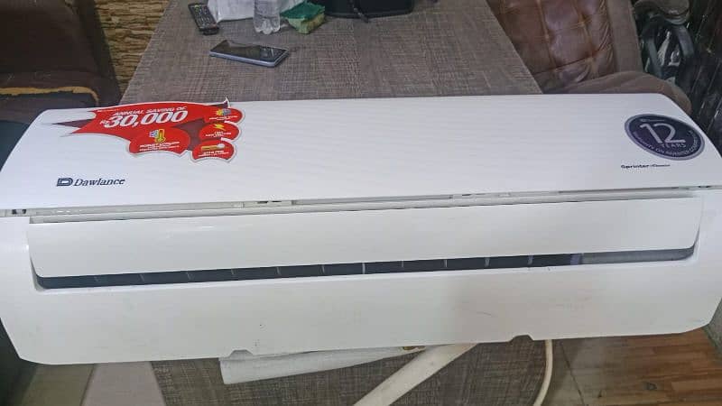DAWLANCE 1 TON DC INVERTER HEAT AND COOL WARRANTY 10 YEAR CARD AVAILLE 1