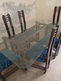 wooden dinning table with chairs