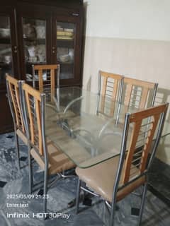 glass top dinning table with 6 chairs
