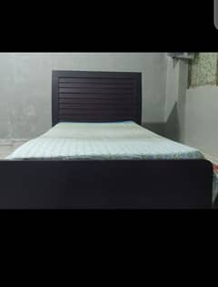 wooden bad with mattress