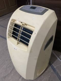 Portable LG AC with staplizer