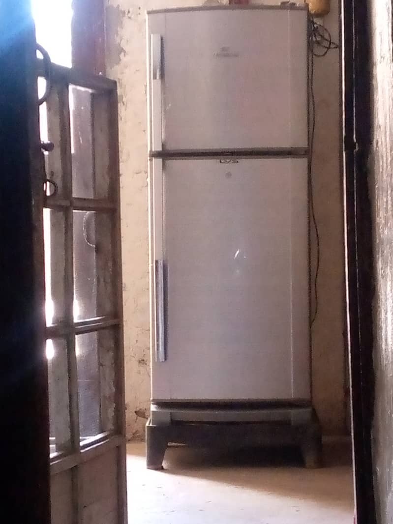 Dawlance Refrigerator with stand (choki) in A one condition,no fault. 1