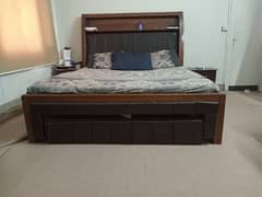 Queen Size Bed with 2 side tables.