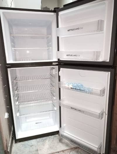 almost New Haire Glass door refrigerator 03095449689