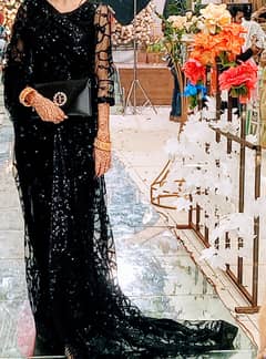 Black saree used but  new quality neat and clean . Once wear