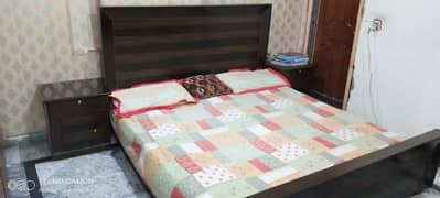 Double bed with side tables