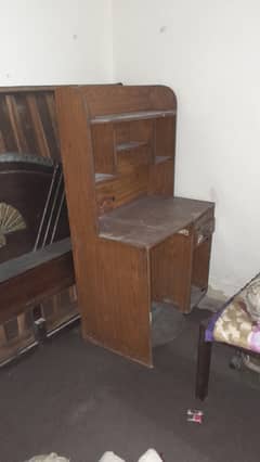 One double bed and one computer rack