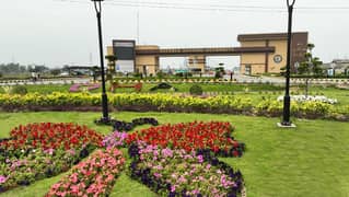 Prime Location 20 Marla Residential Plot on 60 Feet Road Near Main Entrance Gate for Sale in DHA Gujranwala