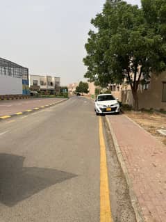 ALI BLOCK Precicnt-12 Near Grand Mosque. Park Face. Corner Category Plot Available FOR SALE