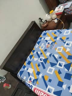 Single wooden bed with new Mattress