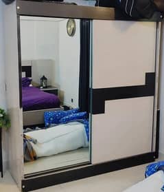 SLIGHTLY USED CUSTOMISED EXTRA SPACIOUS DOUBLE SLIDING CUPBOARD