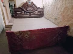 wooden material double bed
