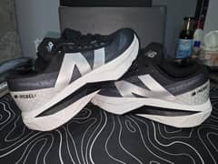 New Balance FuelCell Rebel V4 Shoes | Size Eu 42 | Unleash Your Speed