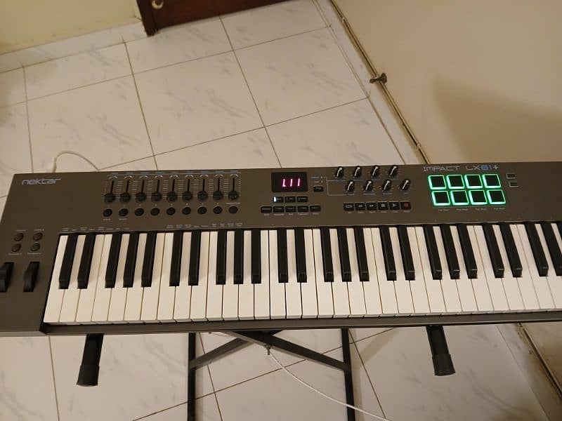 Nektar Impact LX61+ MIDI Piano along with Piano Stand and Software 1