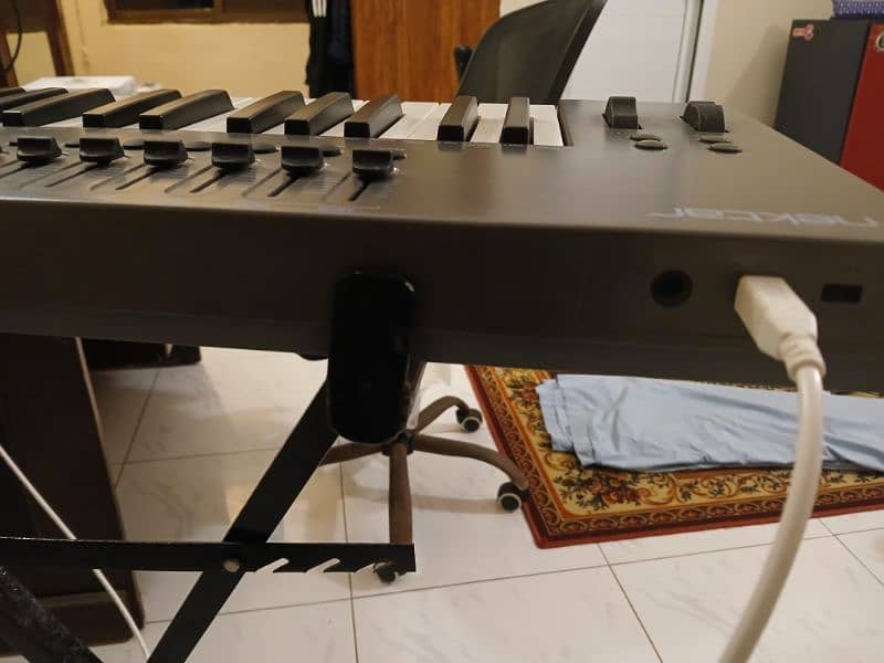 Nektar Impact LX61+ MIDI Piano along with Piano Stand and Software 2