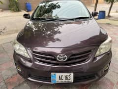 Toyota corolla gli 2013 model red vine colour good condition
