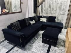 L shaped black sofa