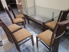 Wooden 6 seater dinning table with chairs