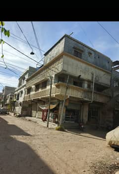 CORNER G+2 HOUSE FOR SALE WITH 4 SHOPS