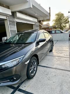 Honda civic Vti oriel prosmetic 2020 model islamabad num total genuine