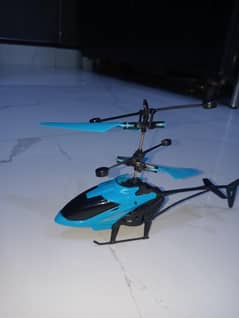 Helicopter with RGB lights in blue color with box and with a handsense