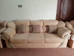 Five piece leather sofa set in cream color