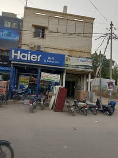 Main Road Prime Location Ground+2 Property With 2 Shops In Malir Saud